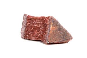 Macro mineral stone Bull eye, tiger's eye in the breed on a white background close-up photo