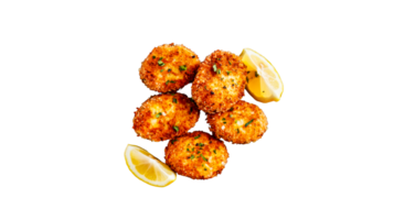 Crispy fried appetizer and lemon wedges on black background, cut out transparent png
