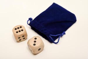 Cube-shaped tokens against a white backdrop. Diverse in magnitude. photo