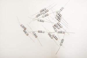 Ceramic resistors on a white background. Electronic components for electronic devices. photo