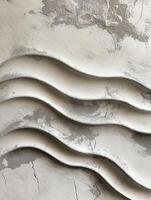 Home textures featuring flowing waves in a minimalist design with light and shadow contrasts. Textured wall display highlighting flowing waves with a blend of gray and white tones photo