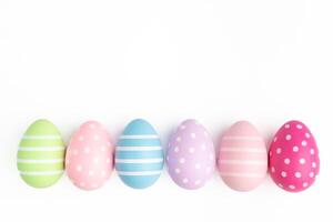 row of easter egg white background empty blank copy space april event spring celebration photo