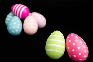 easter egg black background empty blank copy space focus foreground bokeh blur shallow depth field photo