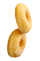 A vertical pile of two brown sugar glazed cinnamon donuts isolated with clipping path in file format png