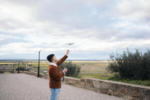 A man is flying a kite photo