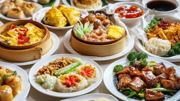 Diverse variety of dim sum and Chinese cuisine displayed on plates during a vibrant dining experience in a bustling restaurant setting photo