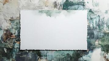 Blank canvas resting on an abstract backdrop with textured layers of green and beige tones, inspiring creativity and artistic expression in a serene environment photo