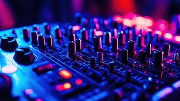 High-energy electronic music mixing equipment in a vibrant atmosphere during a live DJ performance at night photo