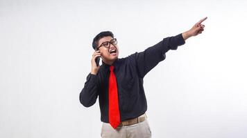 Asian employee business man corporate wearing formal clothes talking on the mobile phone call with frustrated facial expression isolated on white background photo