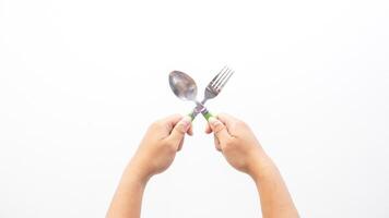 Man Hands Holding Spoon and Fork Isolated on White Background photo