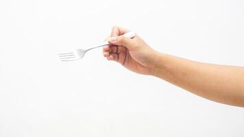 Hand of Man Holding Stainless Steel Fork Isolated on White Background photo