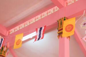 Thai Flags and Buddhist Flags Decorated for Traditions in Thai Temples photo
