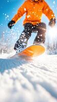 Snowboarder in action, carving through fresh snow, with bright sunlight illuminating scene. dynamic movement creates spray of snow, showcasing thrill of winter sports photo