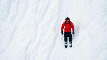 Snowboarder in red jacket riding on fresh powder snow, showcasing skill and adventure in winter landscape photo