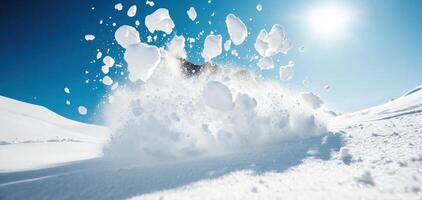 Snowboarder carving through fresh powder, creating dynamic spray of snow. bright sun shines overhead, enhancing exhilarating winter atmosphere photo