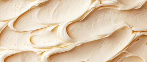 Creamy buttercream frosting with smooth swirls and texture, perfect for decorating cakes and desserts. This rich icing adds delightful touch to any sweet treat photo