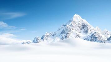 Majestic mountain peak covered with snow under clear blue sky, showcasing beauty of nature and tranquility. serene landscape invites exploration and admiration photo