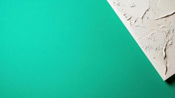 A white wall with a green background photo