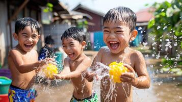 Children enjoying water fights during joyful festival, splashing and laughing together photo