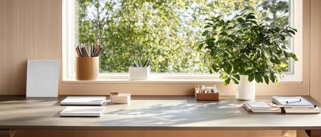 Elegant minimalist workspace featuring monochromatic desk, plant, and stationery photo