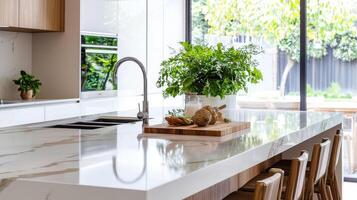 A modern kitchen with marble counter tops photo
