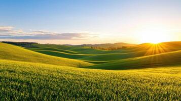 serene landscape at dawn with rolling green hills and bright sun photo
