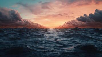 The ocean is calm and peaceful, with a beautiful sunset in the background photo