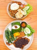 A table with two plates of food on it photo