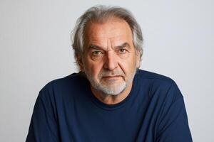 Portrait of a mature man with a thoughtful expression in a casual setting photo