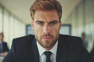 Confident man in formal attire engaging in serious discussion in a modern office setting photo