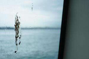 dirty boat window glass closeup photo