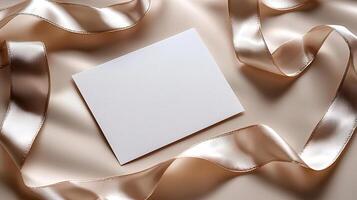 mock up blank card on beige satin ribbon background photo