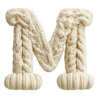 Knitted letter m craft event home studio cozy environment creative viewpoint handmade concept for warm decor photo