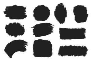 Set of abstract grunge paint shapes in black ink vector
