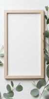Contemporary certificate template with wooden frame and green foliage for elegant design photo