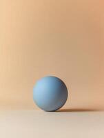 Bold minimalism with a blue sphere on a soft gradient background photo