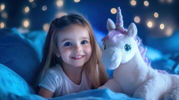 A smiling girl cuddles a unicorn plush toy in a serene night setting. photo