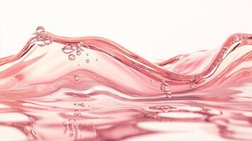 Soft pink water waves with bubbles creating a serene atmosphere. photo