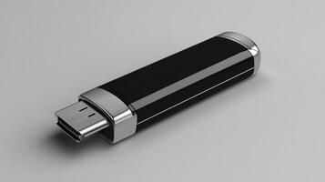 A sleek black USB drive with a silver trim on a smooth surface. photo