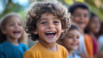 A joyful group of children laughing and enjoying their time together. photo