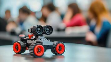 A colorful LEGO robot model in a classroom setting, inspiring creativity. photo
