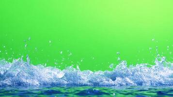 Vibrant waves splashing against a bright green background. photo