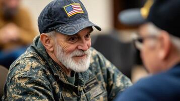 A smiling veteran engages in a warm conversation with a friend. photo