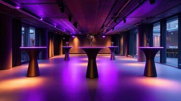 Stylish modern event space with purple lighting and elegant tables. photo