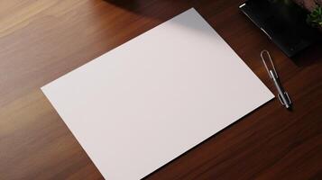 Blank paper on desk with pen and neat workspace photo