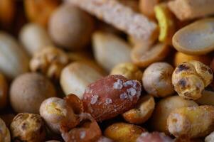 Assorted nuts and seeds create a colorful and inviting snack mix filled with flavor and texture photo