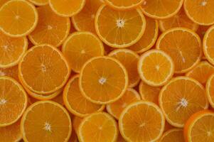 Vibrant orange slices create a colorful display of freshness perfect for summer recipes and healthy snacks photo