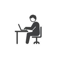 A man is sitting at a desk table with a laptop vector