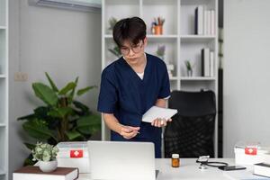 Interactive Learning and Collaboration. A medical student actively engages in study, balancing research and note-taking for professional growth. photo