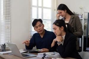 Communication and Issue Resolution. A professional team discusses their challenges, highlighting the importance of effective communication. photo